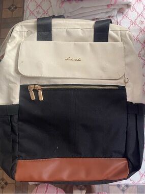 Cream and Black Backpack with Brown Trim